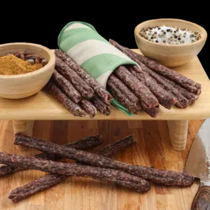 Coils of traditional beef droëwors (dried sausage) hanging in The Village Butcher, Hauraki.
